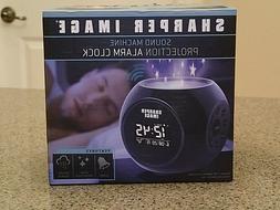 NIB Sharper Image Sound Machine Projection Alarm Clock